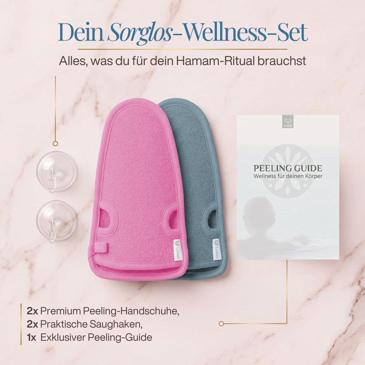 Lieferumfang auf hellem Stein: zwei Peeling-Handschuhe in Pink und Grau und zwei Saughaken